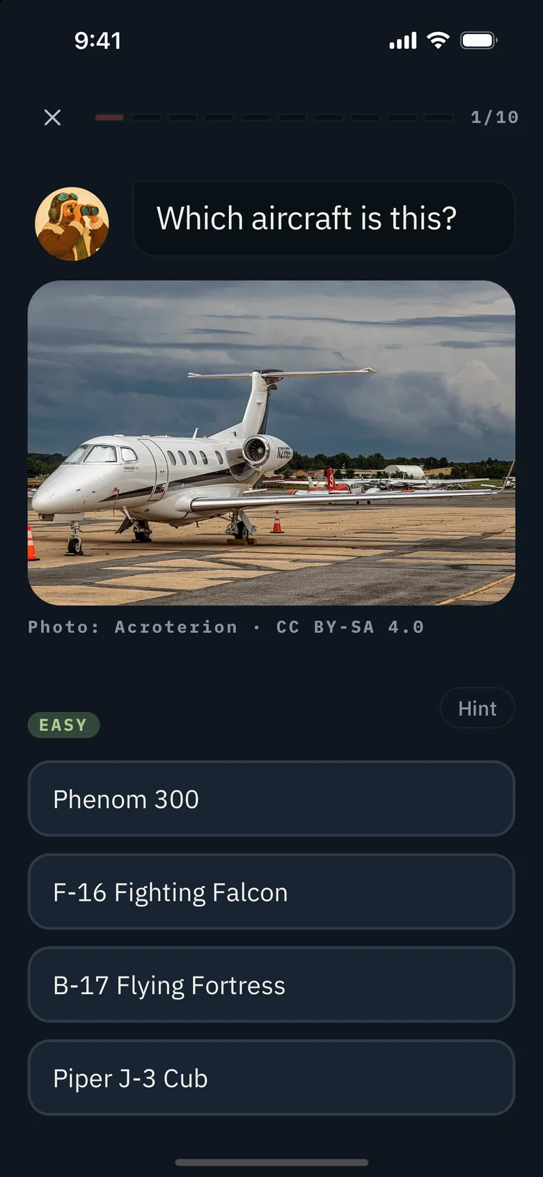 A Spotting flash card in Pilotage: a photo of a parked business jet, four aircraft names to choose from, and a Hint button